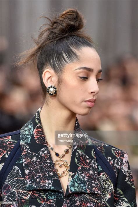 Yasmin Wijnaldum walks the runway during the Chanel show as 